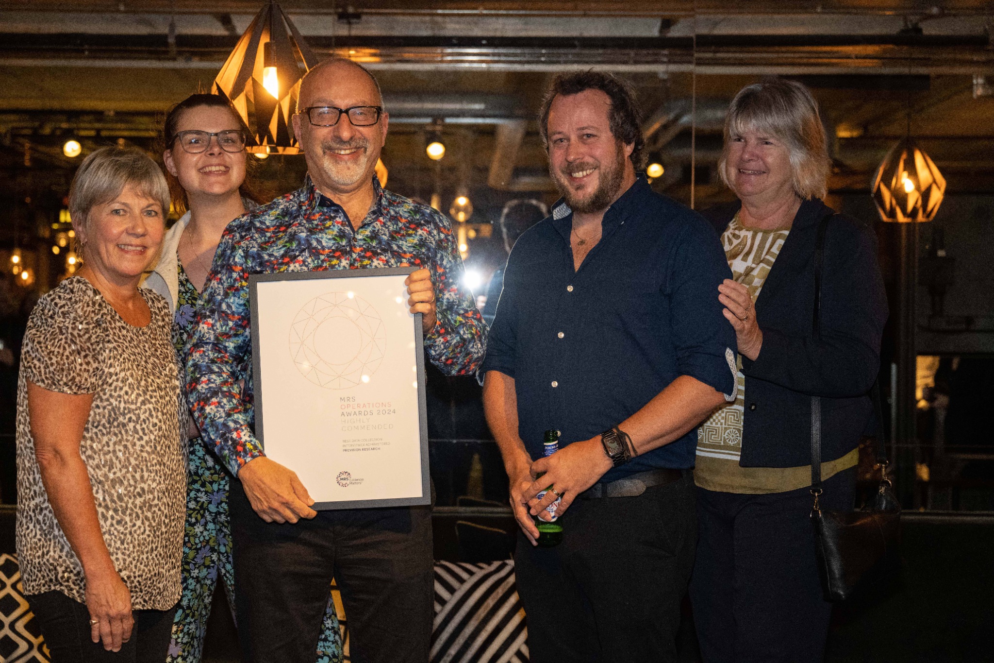 Prevision team receiving MRS Oppies 2024 award